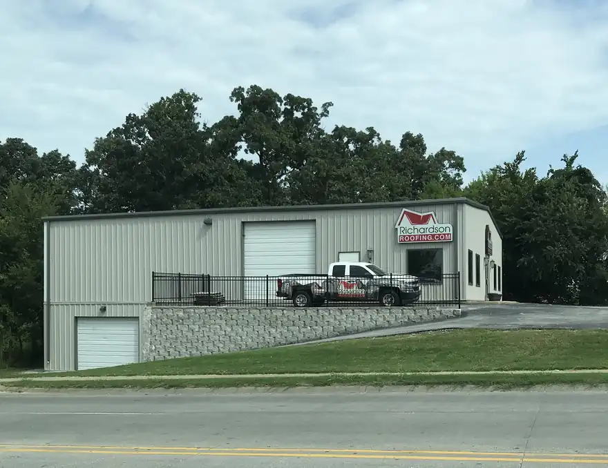 Richardson Roofing's shop at 4500 N Thompson St in Springdale with a branded company pickup out front