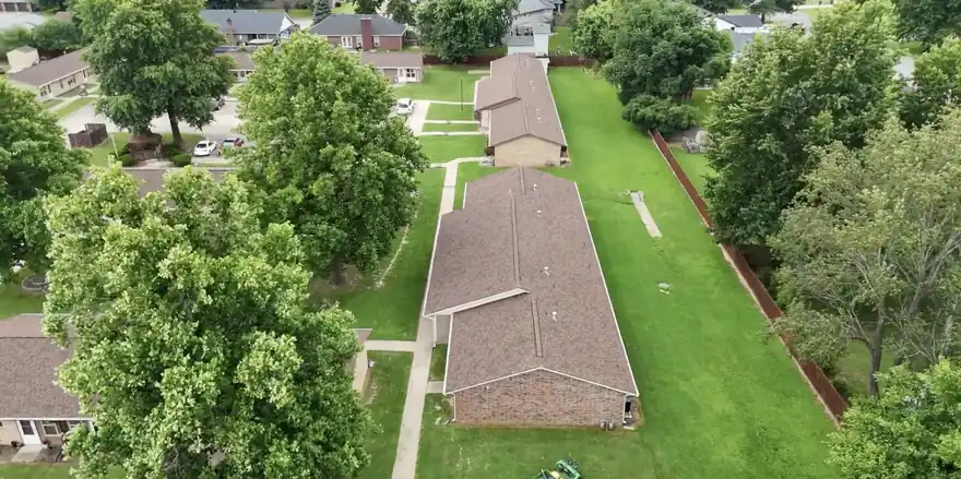 Aerial of the 23-building Springdale community after its roofs were replaced following hail damage