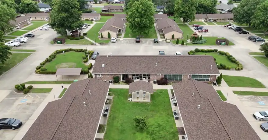 Aerial of the Carley Road community roofs with new impact-resistant shingles and fresh gutters