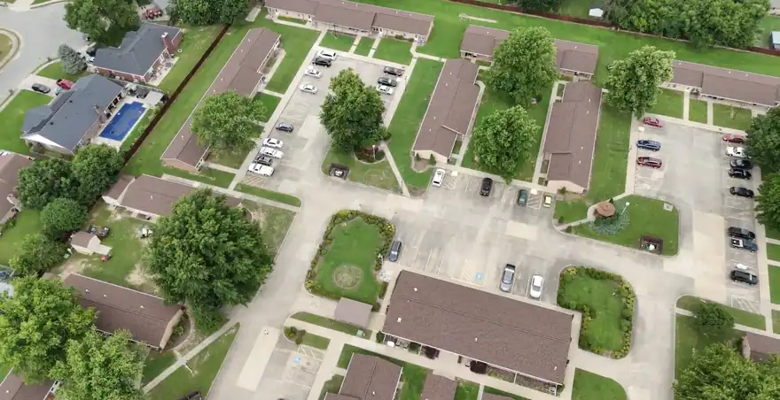 Aerial view of the 23-building Springdale community off Carley Road after Richardson Roofing's hail replacement